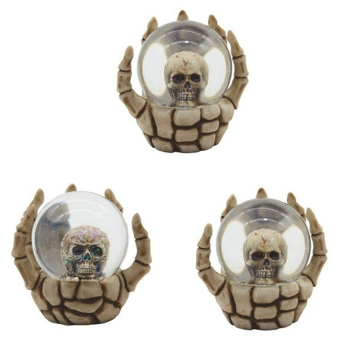 Skull Snow Globe in Skeleton Hand 3 Piece Set 3 3/4"W